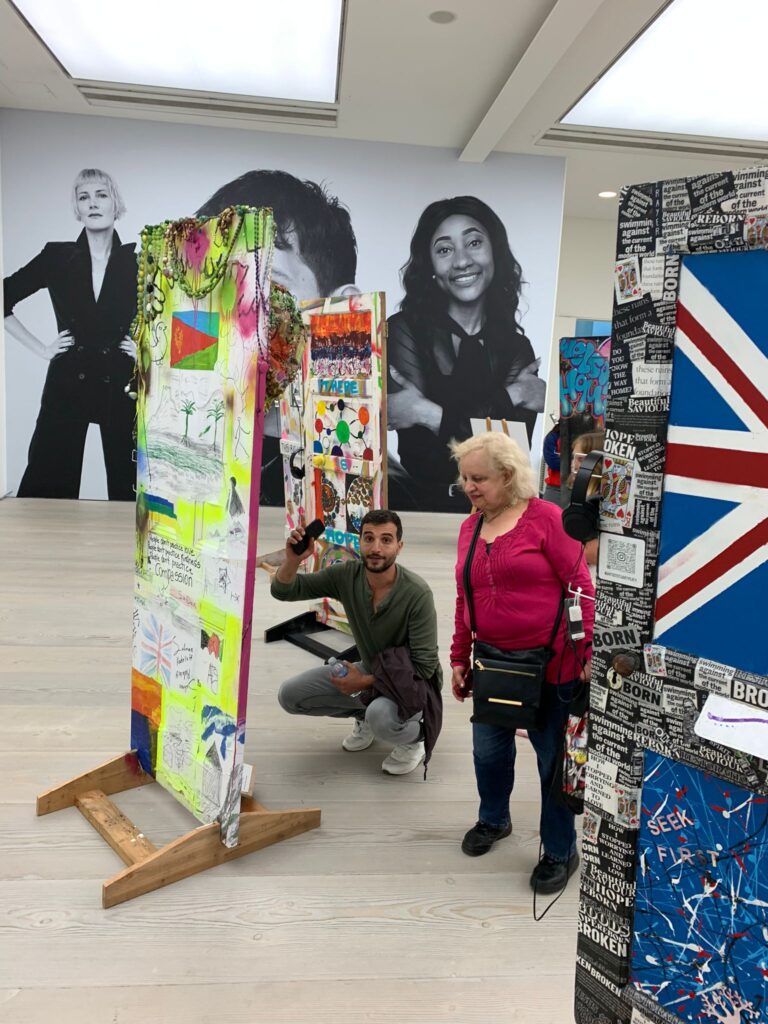 Two people in an art gallery