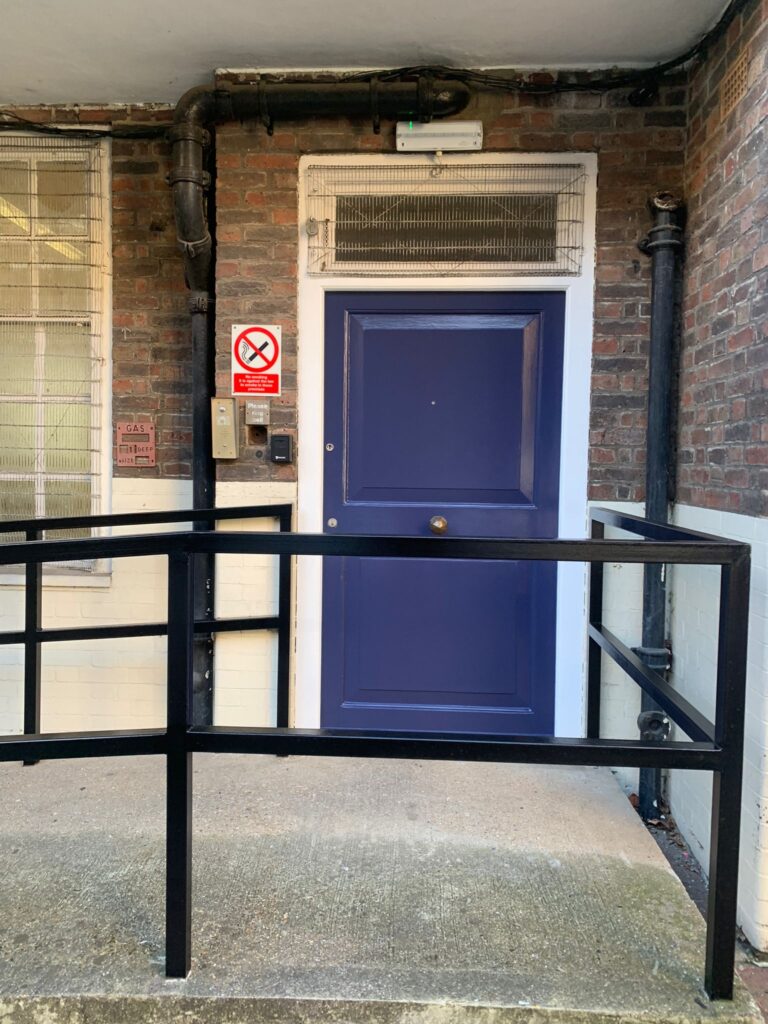 A photo of the front door of the WCC office