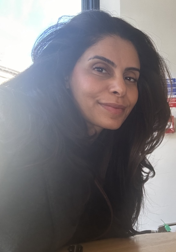 Photograph of a smiling woman, Nisha