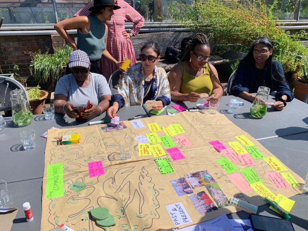 People work on a creative activity together